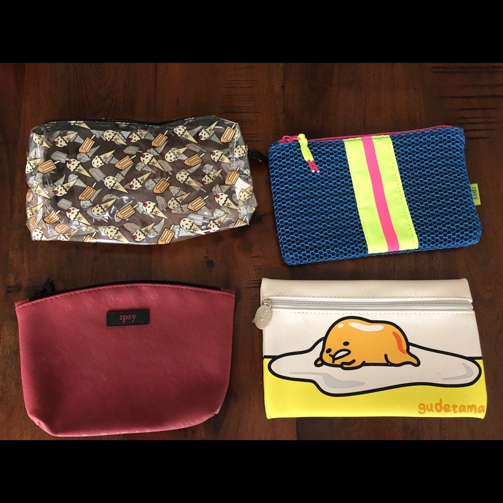 Four IPSY cosmetic bags 💄